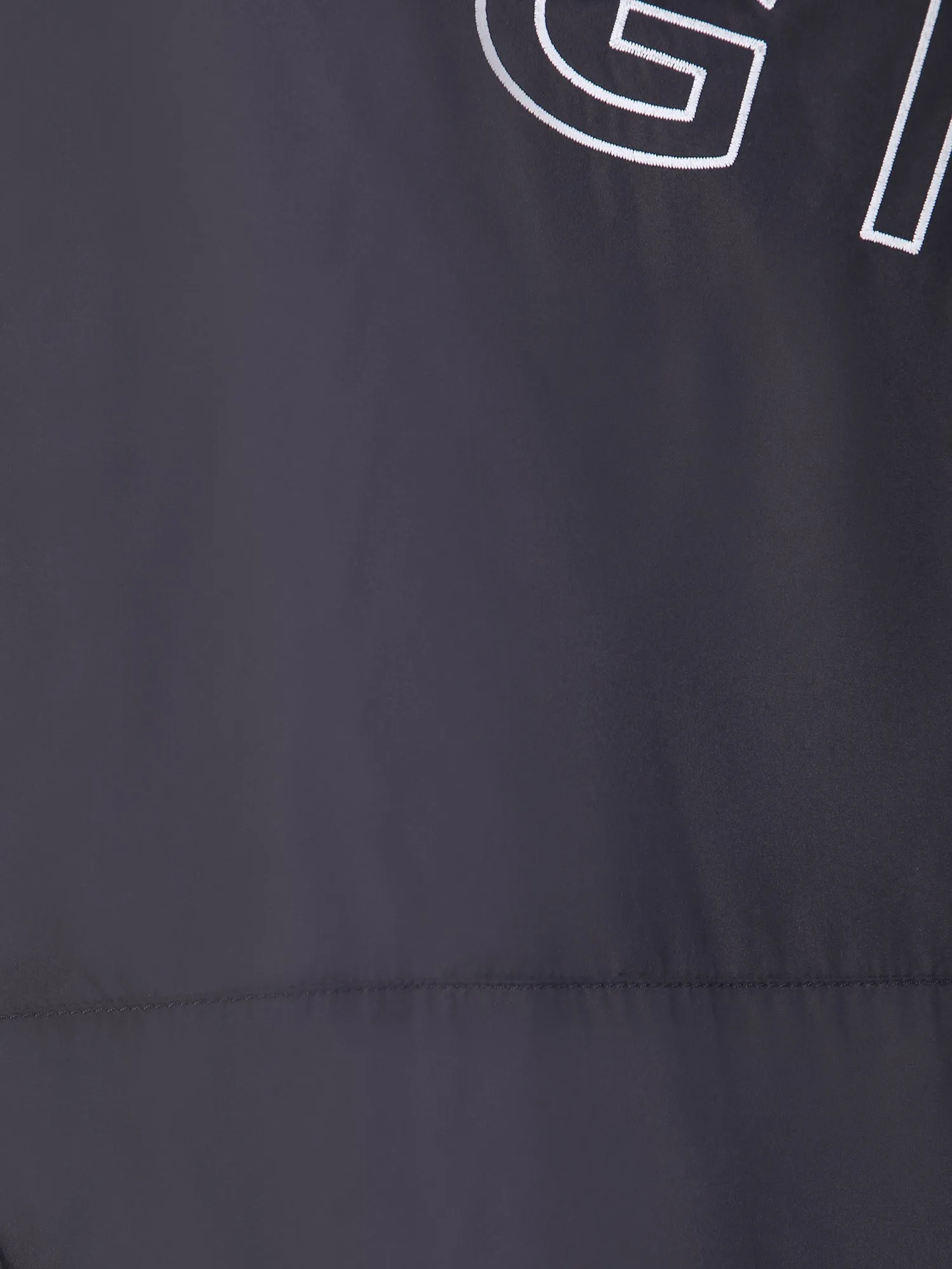 Black nylon track jacket